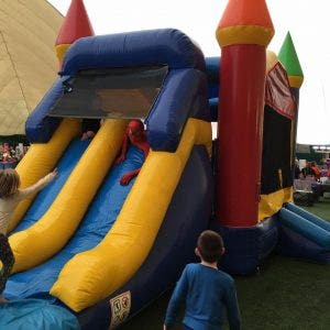 Rainbow combo bounce house with slide