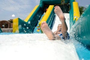 Inflatable water slides are hot ticket items in the summer