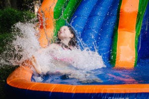 A commercial bounce house may include water features