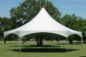 high peak frame tent set up in a park