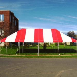 A pole tent from Tent and Table set up outside