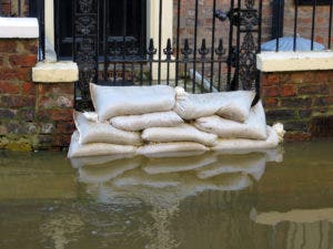 Sand bags can be deployed in doorways and other entrances to prevent excessive water damage