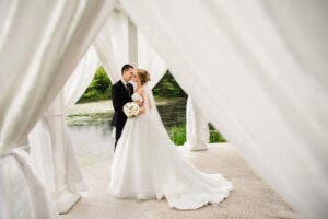 A happy couple enjoying their high peak tent